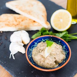 <span>Baba Ganache aubergine with tahini and garlic</span><i>→</i>